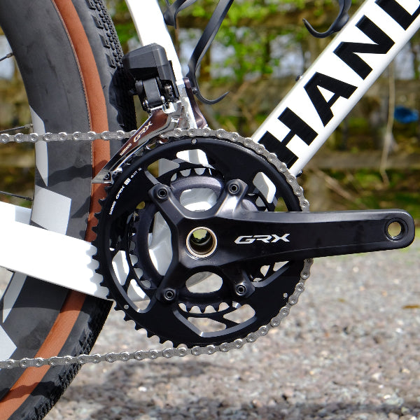 Handsling A1R0evoG Shimano GRX Di2 white gravel bike with Zipp wheels.