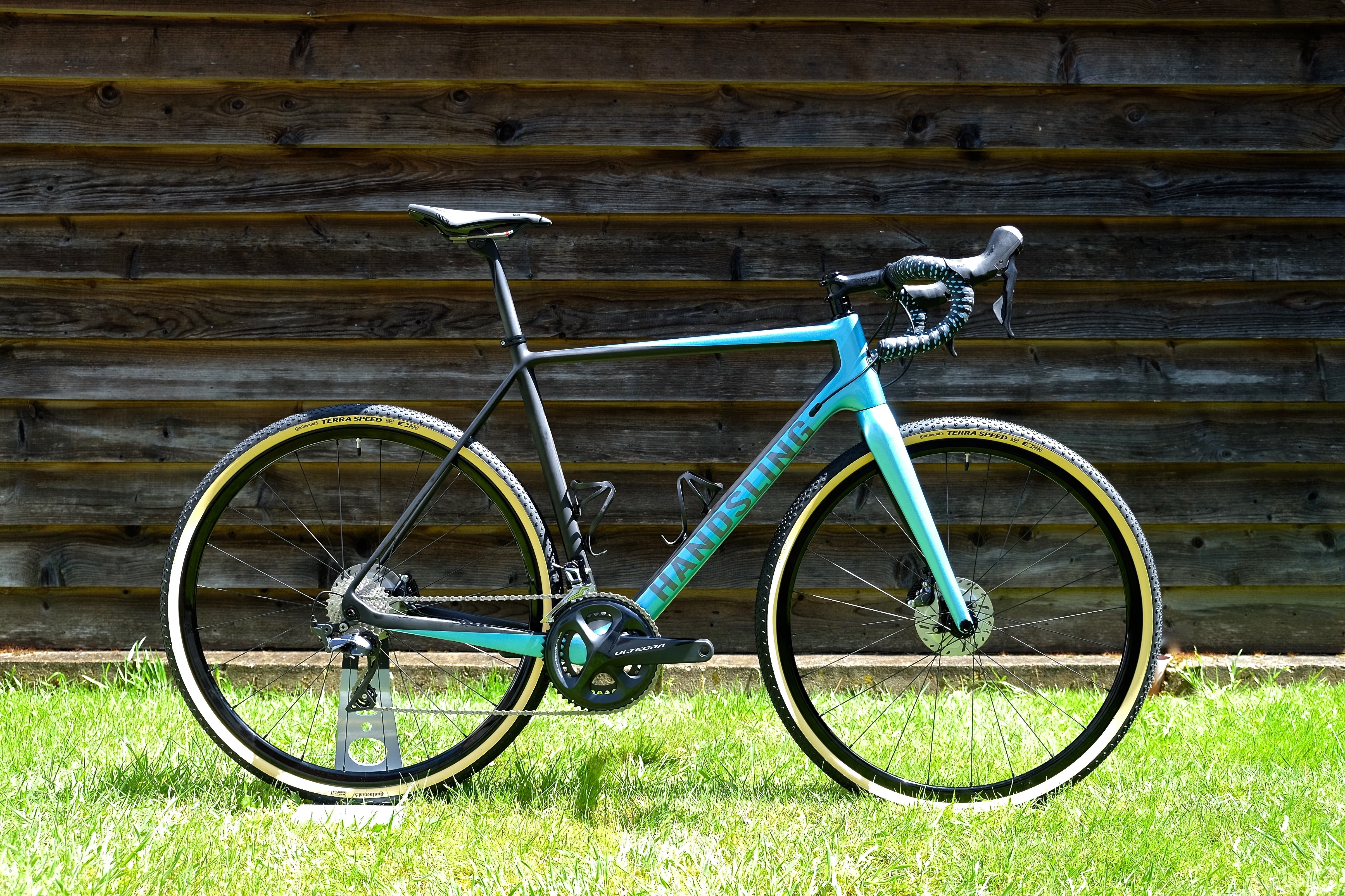 Carbon Seat Post on Handsling blue bike